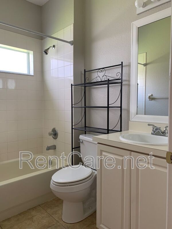 3/2 House in Gated Community close to UCF in East Orlando.  Available Now. property image