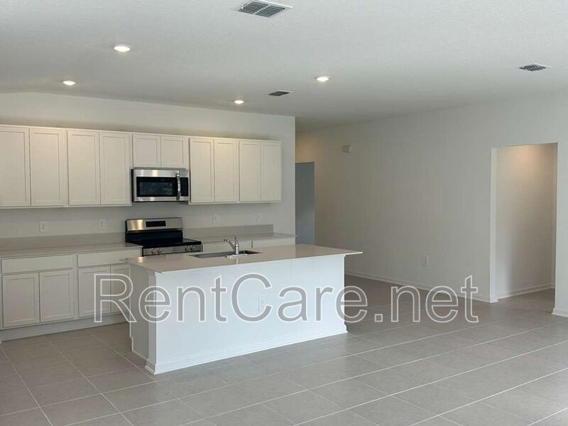 New Construction 4/3 in the beautiful Gated/Guarded Golf Community of Providence in Davenport! property image