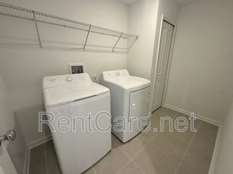 New Construction 4/3 in the beautiful Gated/Guarded Golf Community of Providence in Davenport! property image