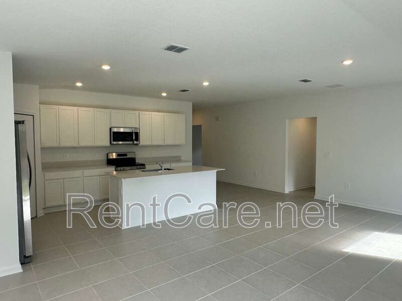 New Construction 4/3 in the beautiful Gated/Guarded Golf Community of Providence in Davenport! property image