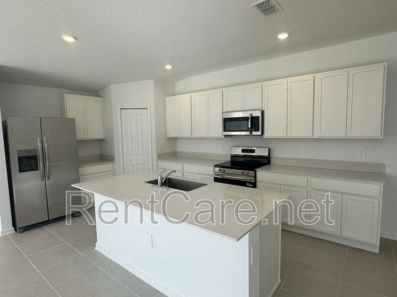 New Construction 4/3 in the beautiful Gated/Guarded Golf Community of Providence in Davenport! property image