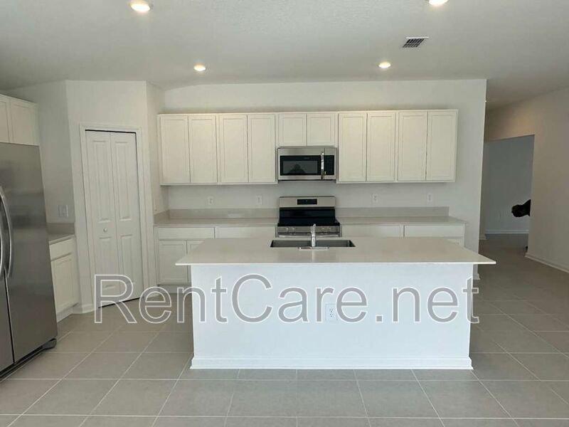 New Construction 4/3 in the beautiful Gated/Guarded Golf Community of Providence in Davenport! property image