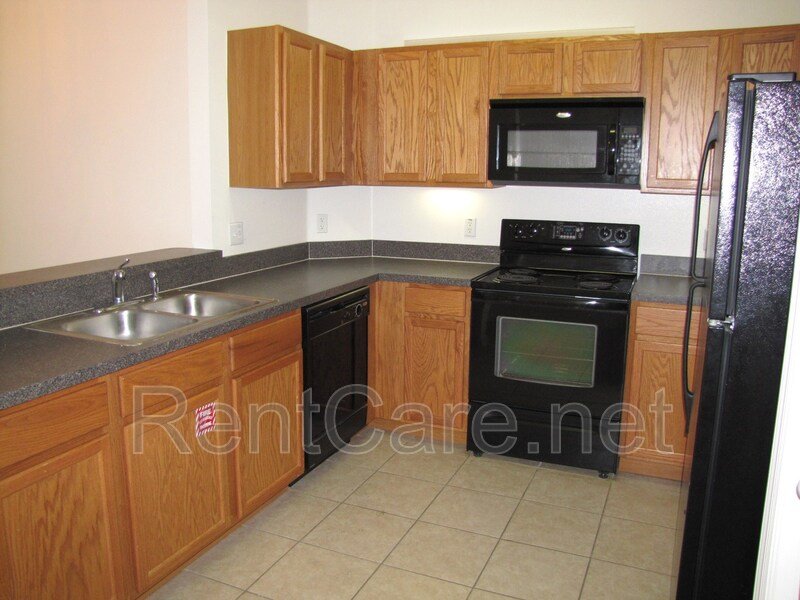 Spacious 3/2 Condo in the Gated Oakwater Community with Single Car Garage! Brand new carpets and Freshly Painted! property image