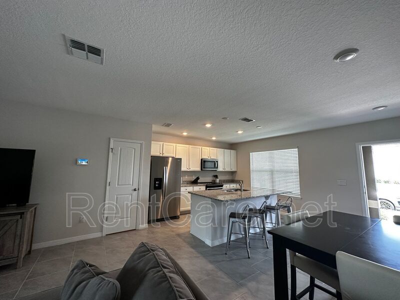 Resort Style Living! Stunning 3/2.5 Townhome in Waterleigh! Available April! property image