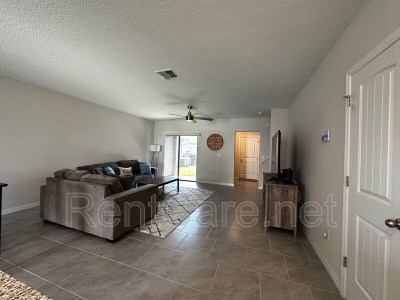 Resort Style Living! Stunning 3/2.5 Townhome in Waterleigh! Available April! property image