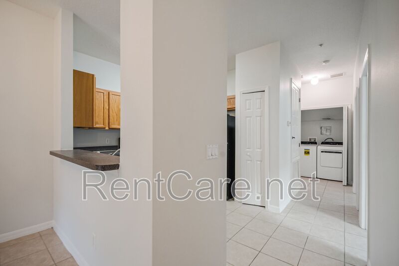 Spacious 3/2 Condo in the Gated Oakwater Community with Single Car Garage! Brand new carpets and Freshly Painted! property image