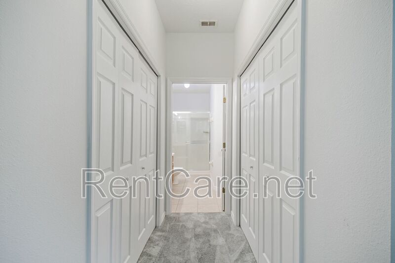 Spacious 3/2 Condo in the Gated Oakwater Community with Single Car Garage! Brand new carpets and Freshly Painted! property image