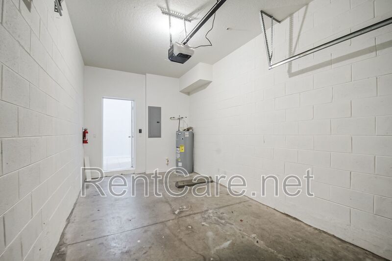 Spacious 3/2 Condo in the Gated Oakwater Community with Single Car Garage! Brand new carpets and Freshly Painted! property image