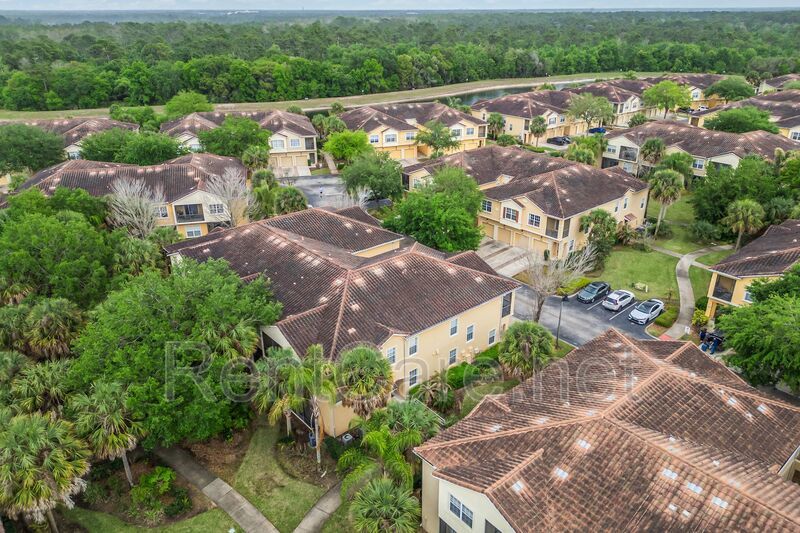 Spacious 3/2 Condo in the Gated Oakwater Community with Single Car Garage! Brand new carpets and Freshly Painted! property image