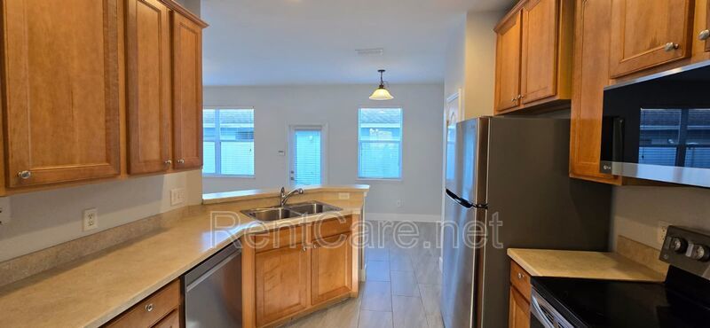 Lovely 2/2.5 Town Home in Beacon Park S. Orlando with two car detached garage! Available Now! property image