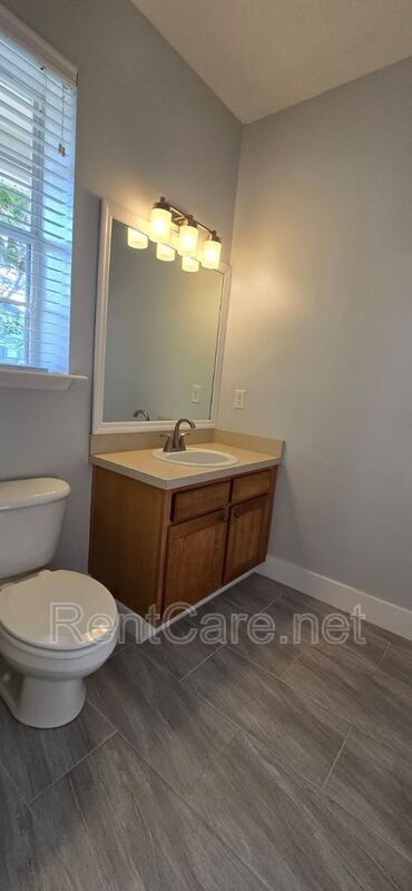 Lovely 2/2.5 Town Home in Beacon Park S. Orlando with two car detached garage! Available Now! property image