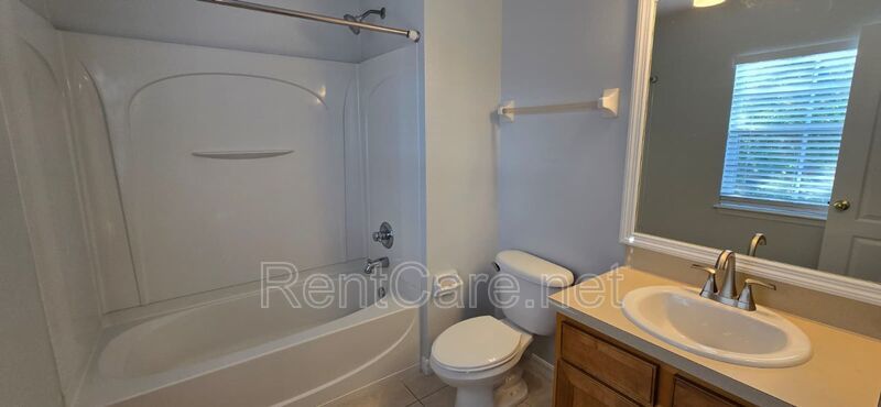 Lovely 2/2.5 Town Home in Beacon Park S. Orlando with two car detached garage! Available Now! property image