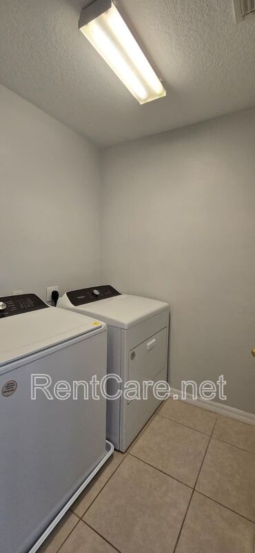 Lovely 2/2.5 Town Home in Beacon Park S. Orlando with two car detached garage! Available Now! property image