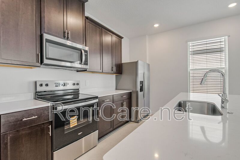 Brand New 4/2.5 with Loft & 2 Car Garage at Prime Location! property image