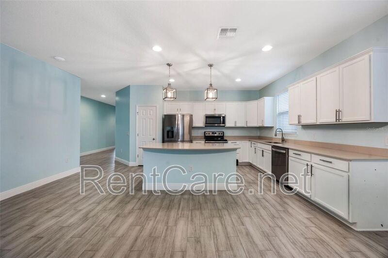 Gorgeous 3/2 in St. Cloud with fence enclosed yard and 3 car garage!  Available Now! property image