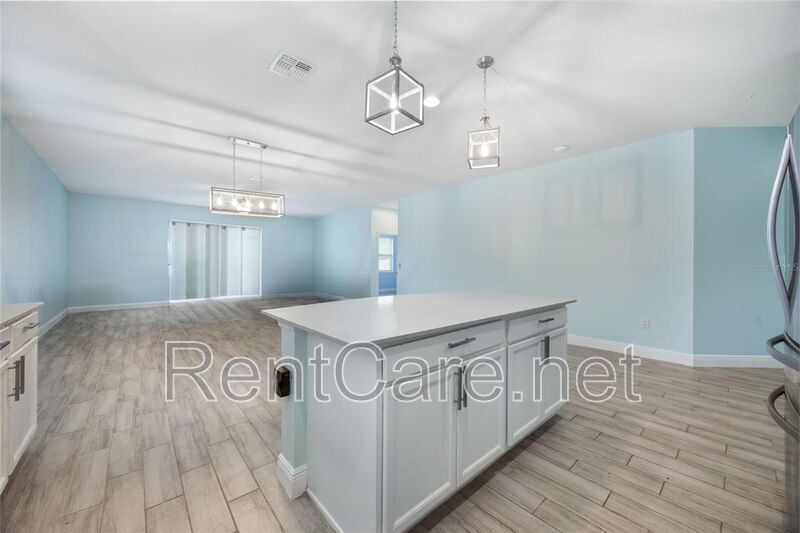 Gorgeous 3/2 in St. Cloud with fence enclosed yard and 3 car garage!  Available Now! property image