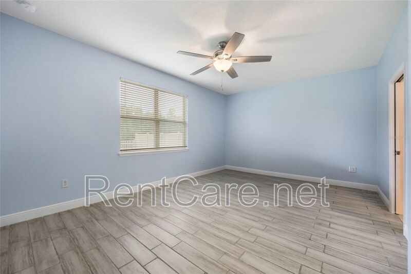 Gorgeous 3/2 in St. Cloud with fence enclosed yard and 3 car garage!  Available Now! property image