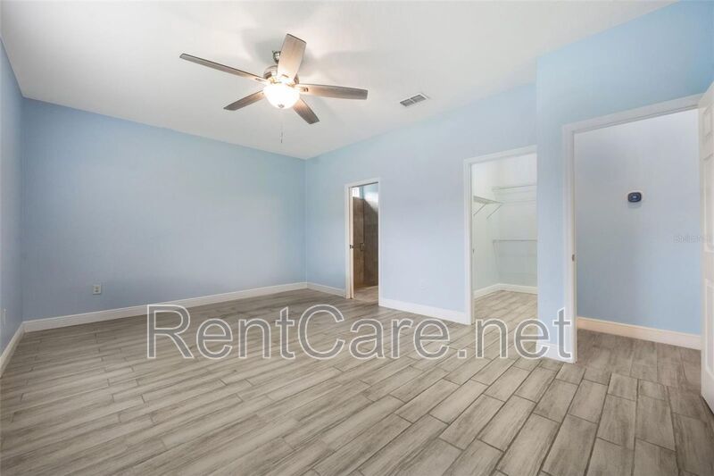 Gorgeous 3/2 in St. Cloud with fence enclosed yard and 3 car garage!  Available Now! property image