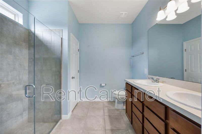 Gorgeous 3/2 in St. Cloud with fence enclosed yard and 3 car garage!  Available Now! property image