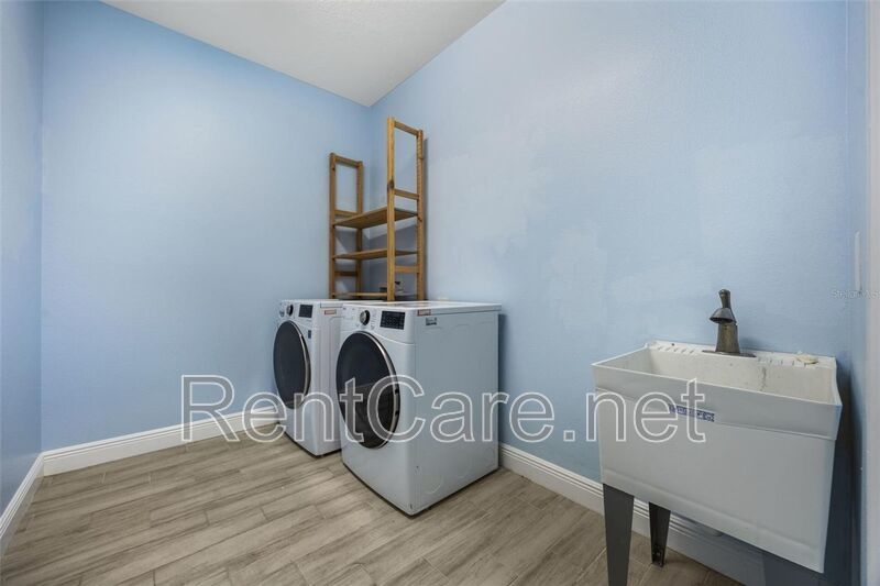 Gorgeous 3/2 in St. Cloud with fence enclosed yard and 3 car garage!  Available Now! property image