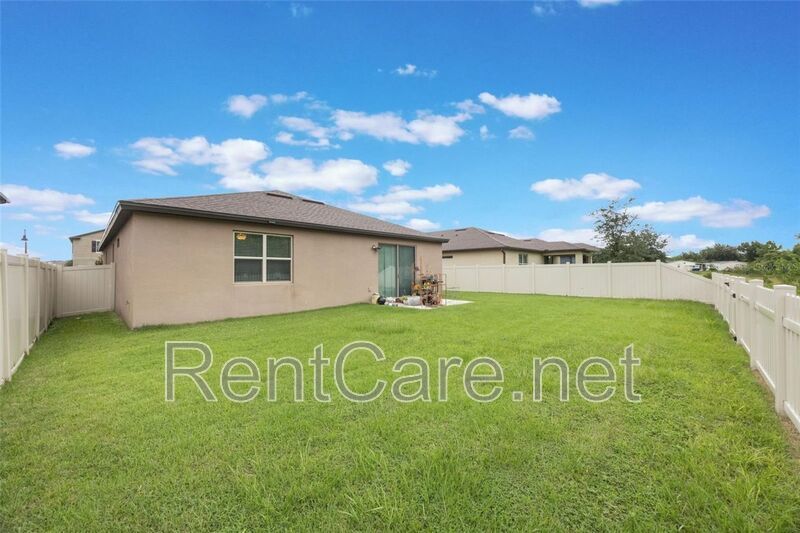 Gorgeous 3/2 in St. Cloud with fence enclosed yard and 3 car garage!  Available Now! property image