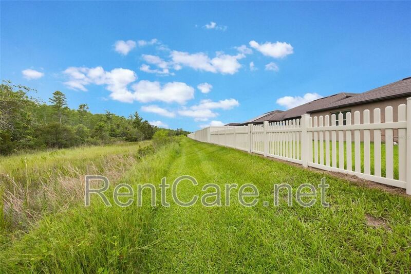 Gorgeous 3/2 in St. Cloud with fence enclosed yard and 3 car garage!  Available Now! property image