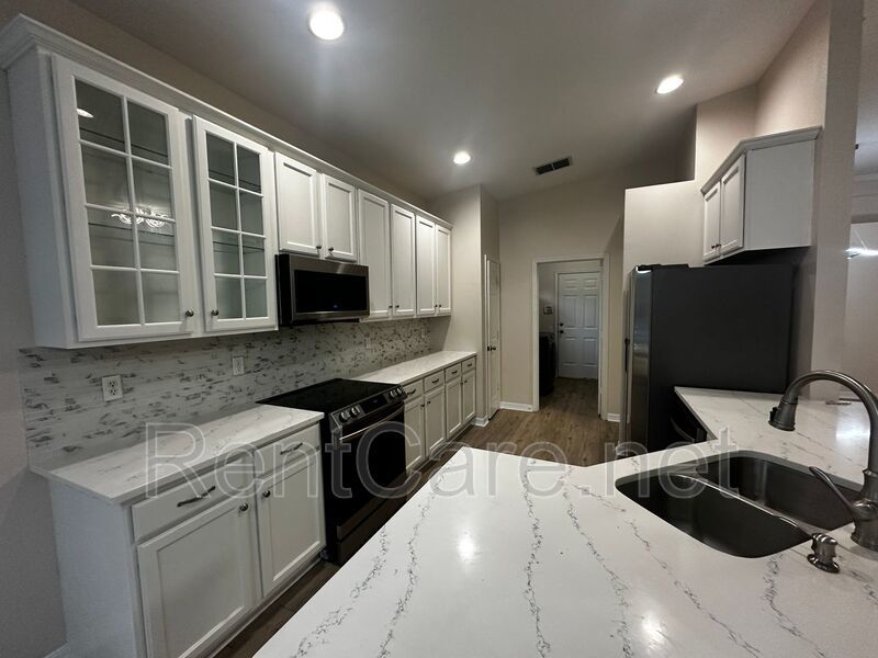 Gorgeous 3/2 with private pool in the Gated and Guarded Reserve at Belmere! property image
