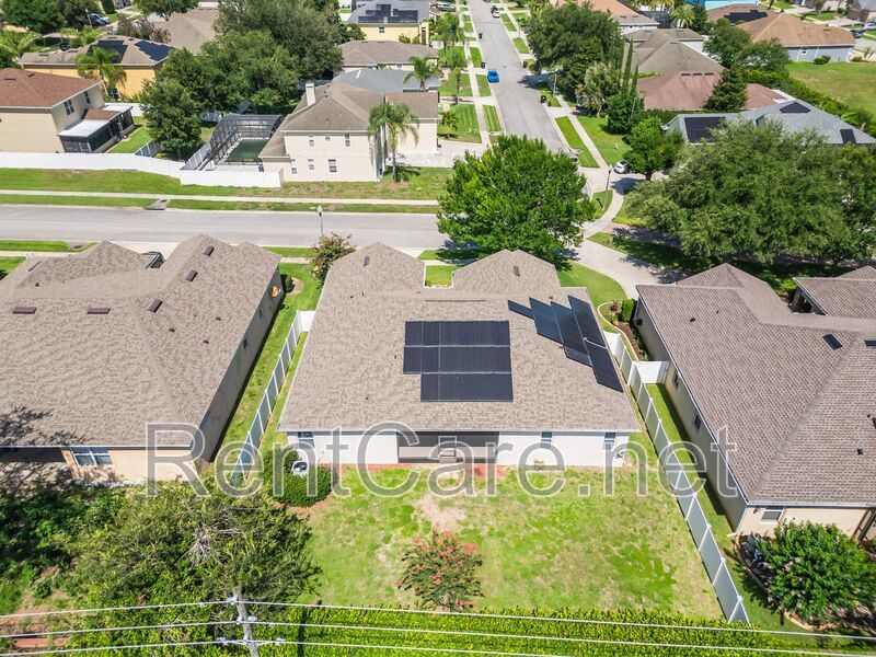Gorgeous 4/2 in Apopka with Solar Panels and large fence enclosed yard!  Available Now! property image