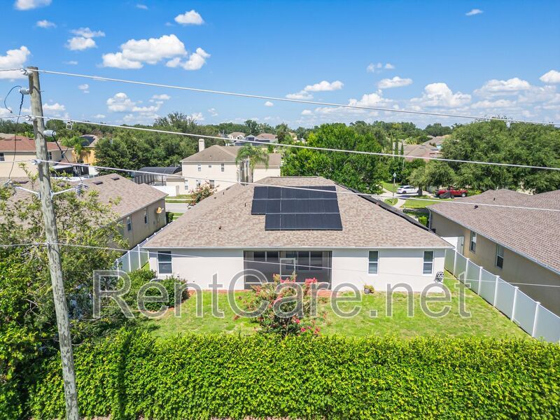 Gorgeous 4/2 in Apopka with Solar Panels and large fence enclosed yard!  Available Now! property image
