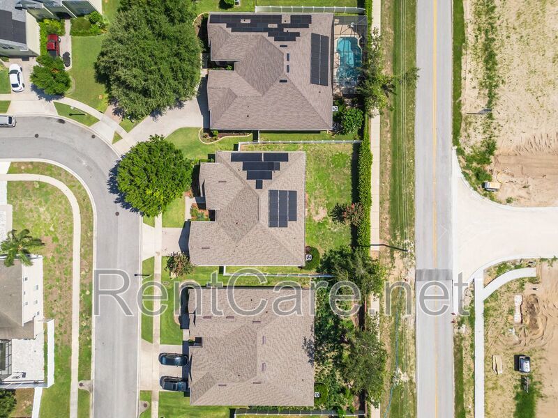 Gorgeous 4/2 in Apopka with Solar Panels and large fence enclosed yard!  Available Now! property image