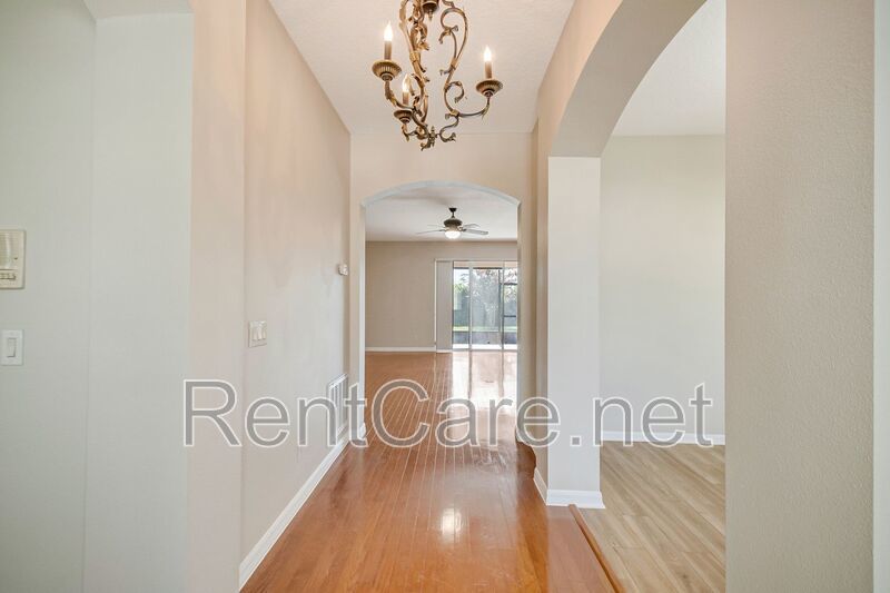 Gorgeous 4/2 in Apopka with Solar Panels and large fence enclosed yard!  Available Now! property image