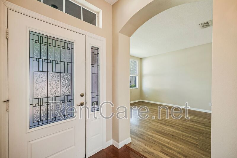 Gorgeous 4/2 in Apopka with Solar Panels and large fence enclosed yard!  Available Now! property image