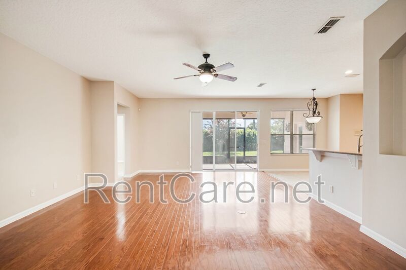 Gorgeous 4/2 in Apopka with Solar Panels and large fence enclosed yard!  Available Now! property image