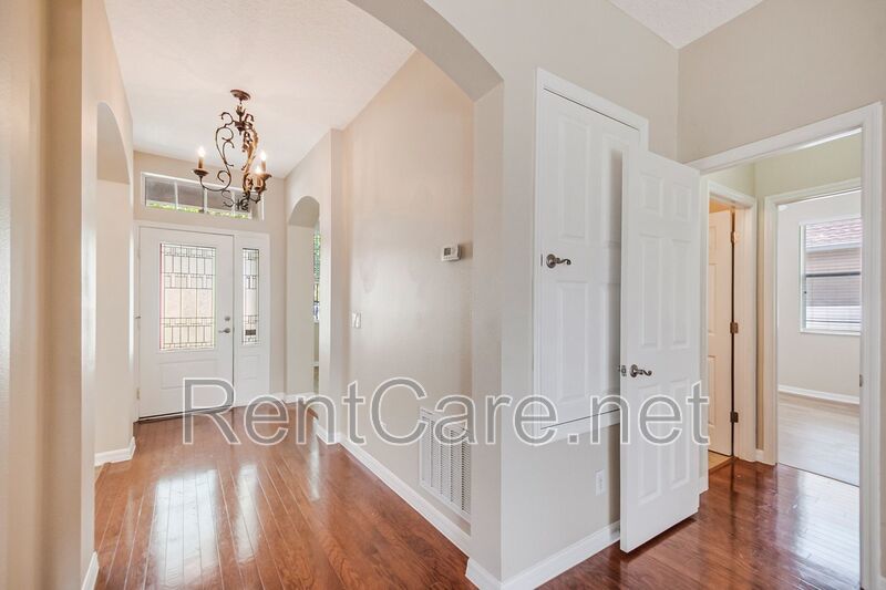 Gorgeous 4/2 in Apopka with Solar Panels and large fence enclosed yard!  Available Now! property image
