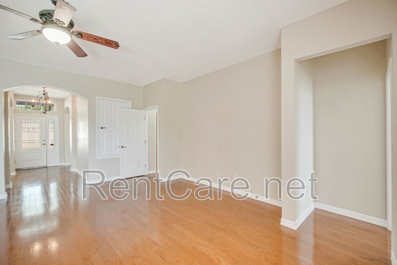Gorgeous 4/2 in Apopka with Solar Panels and large fence enclosed yard!  Available Now! property image