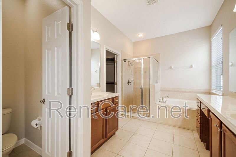 Gorgeous 4/2 in Apopka with Solar Panels and large fence enclosed yard!  Available Now! property image