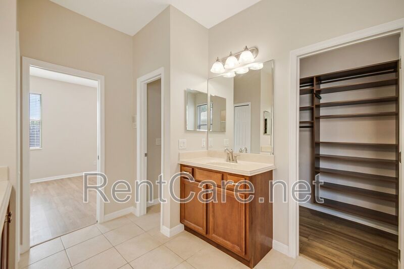 Gorgeous 4/2 in Apopka with Solar Panels and large fence enclosed yard!  Available Now! property image
