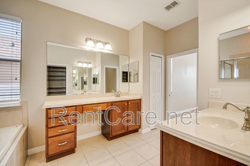 Gorgeous 4/2 in Apopka with Solar Panels and large fence enclosed yard!  Available Now! property image