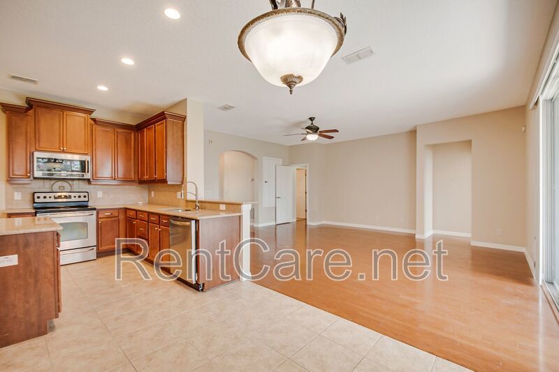Gorgeous 4/2 in Apopka with Solar Panels and large fence enclosed yard!  Available Now! property image