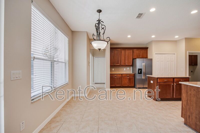 Gorgeous 4/2 in Apopka with Solar Panels and large fence enclosed yard!  Available Now! property image
