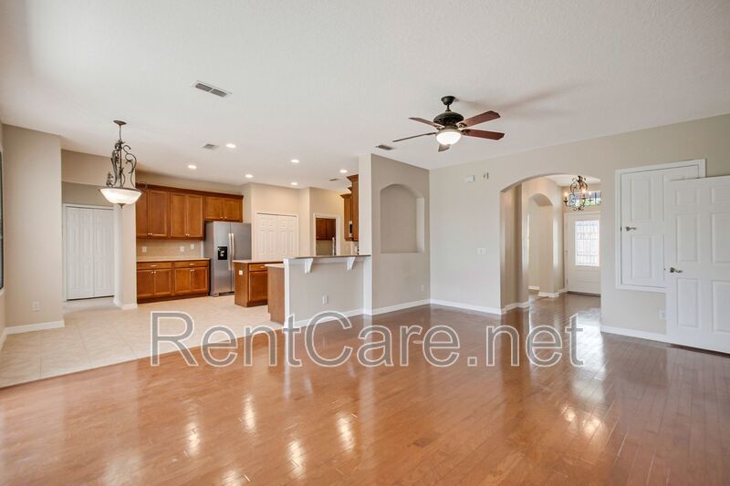 Gorgeous 4/2 in Apopka with Solar Panels and large fence enclosed yard!  Available Now! property image