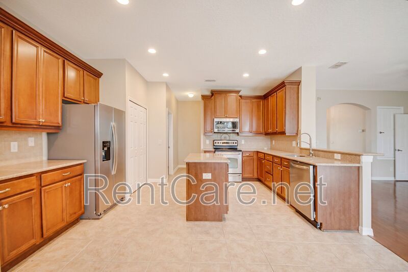 Gorgeous 4/2 in Apopka with Solar Panels and large fence enclosed yard!  Available Now! property image