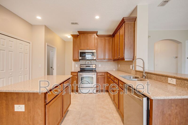 Gorgeous 4/2 in Apopka with Solar Panels and large fence enclosed yard!  Available Now! property image
