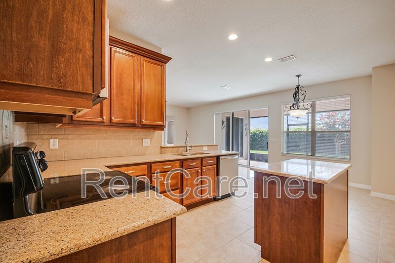 Gorgeous 4/2 in Apopka with Solar Panels and large fence enclosed yard!  Available Now! property image