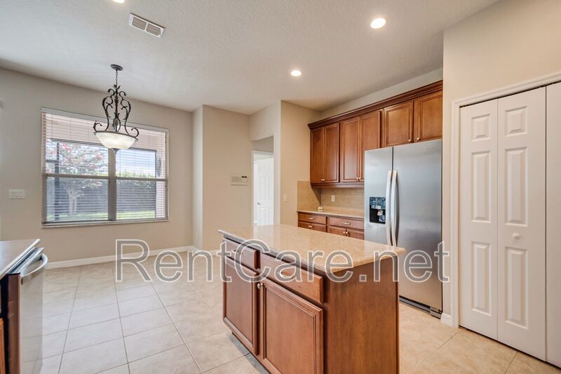 Gorgeous 4/2 in Apopka with Solar Panels and large fence enclosed yard!  Available Now! property image