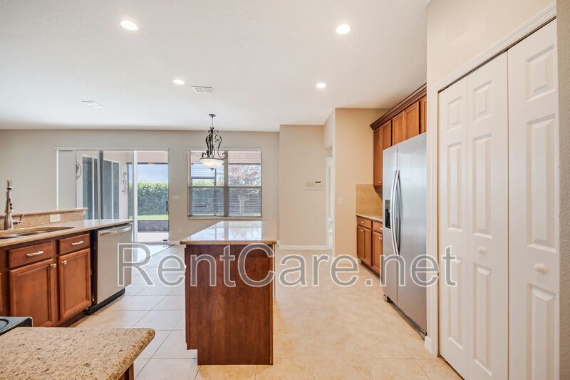 Gorgeous 4/2 in Apopka with Solar Panels and large fence enclosed yard!  Available Now! property image