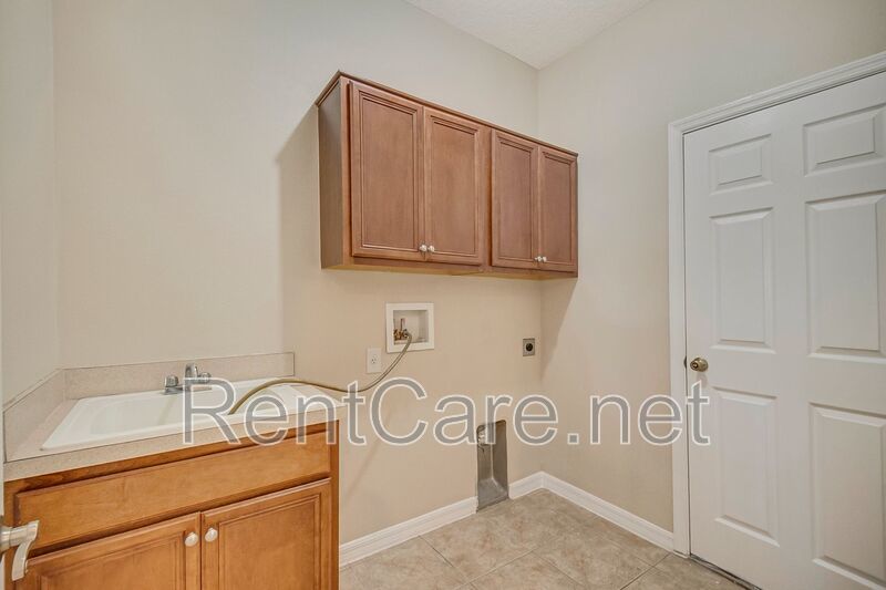 Gorgeous 4/2 in Apopka with Solar Panels and large fence enclosed yard!  Available Now! property image