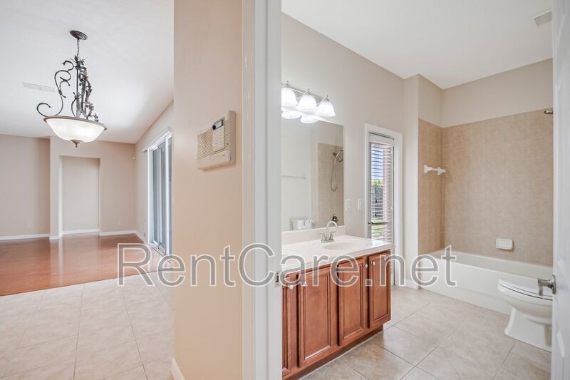 Gorgeous 4/2 in Apopka with Solar Panels and large fence enclosed yard!  Available Now! property image