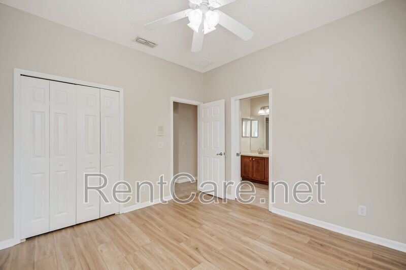 Gorgeous 4/2 in Apopka with Solar Panels and large fence enclosed yard!  Available Now! property image