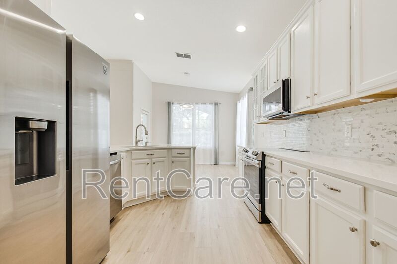 Gorgeous 3/2 with private pool in the Gated and Guarded Reserve at Belmere! property image
